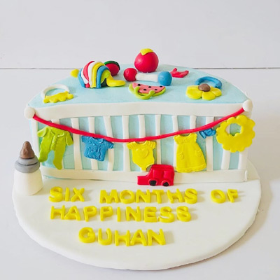 Baby Cot Half Birthday Theme cake